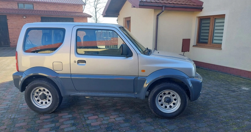 Suzuki Jimny cena 35700 przebieg: 155460, rok produkcji 2011 z Nidzica małe 211